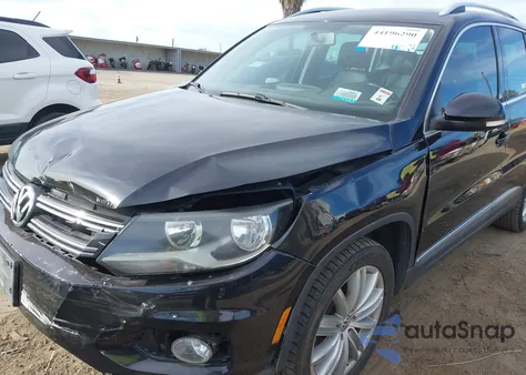 2014 Volkswagen Tiguan Sel z USA, uszkodzony, nr VIN WVGAV3AX4EW578234